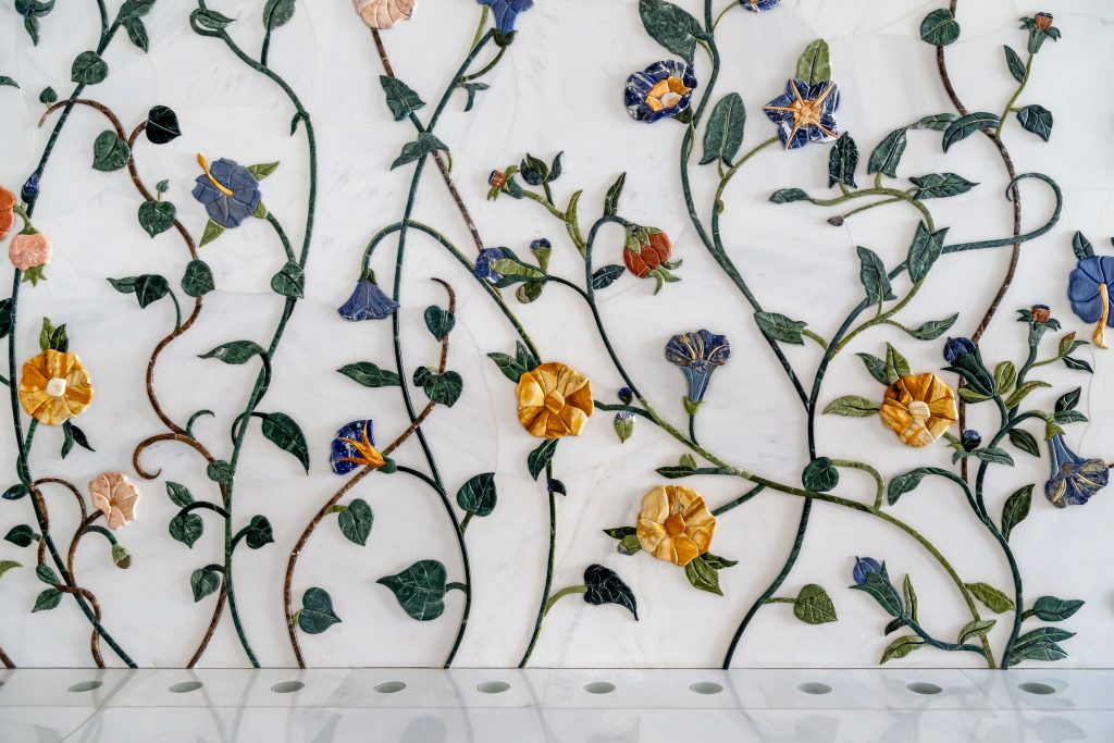 wall decorated with tiles in shape of flowers